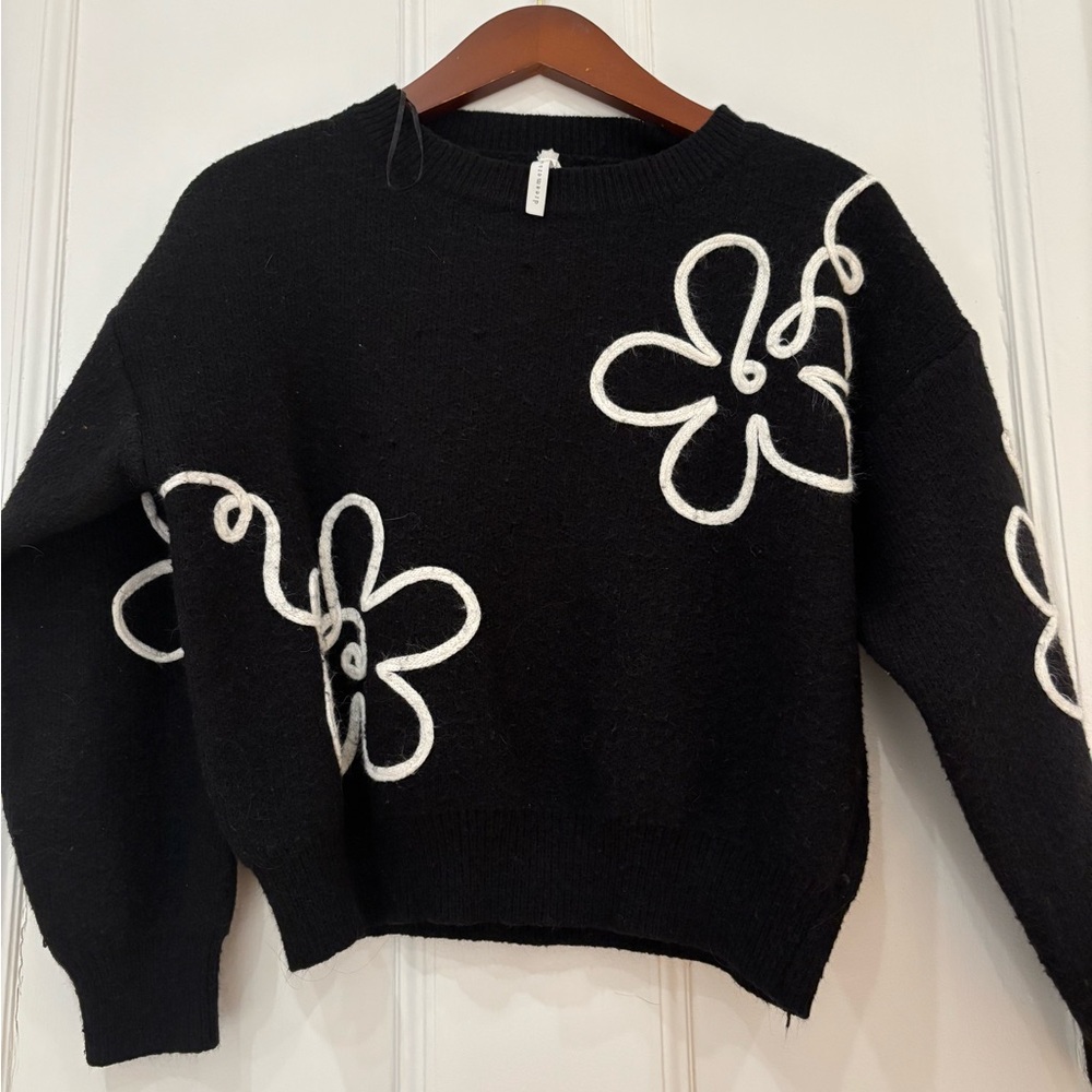 Slightly oversized knitted sweater